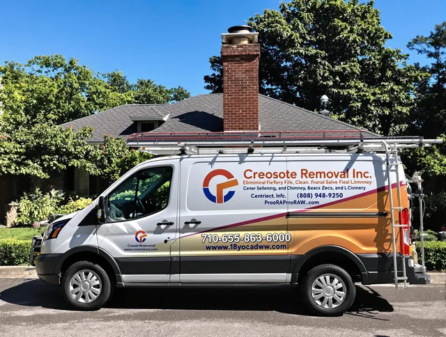 Akron Chimney Sweep technician removing creosote safely in Akron, OH
